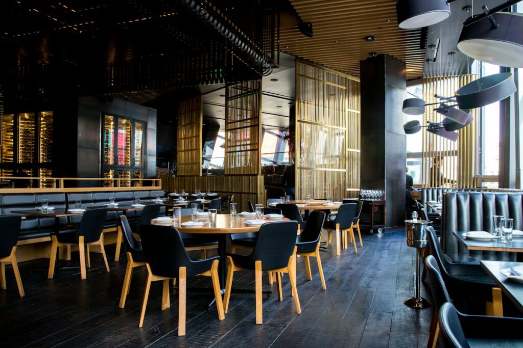 Bright cafe interior with wooden tables